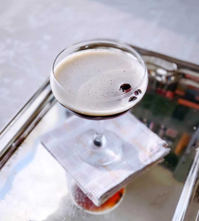 espresso martini on a silver tray