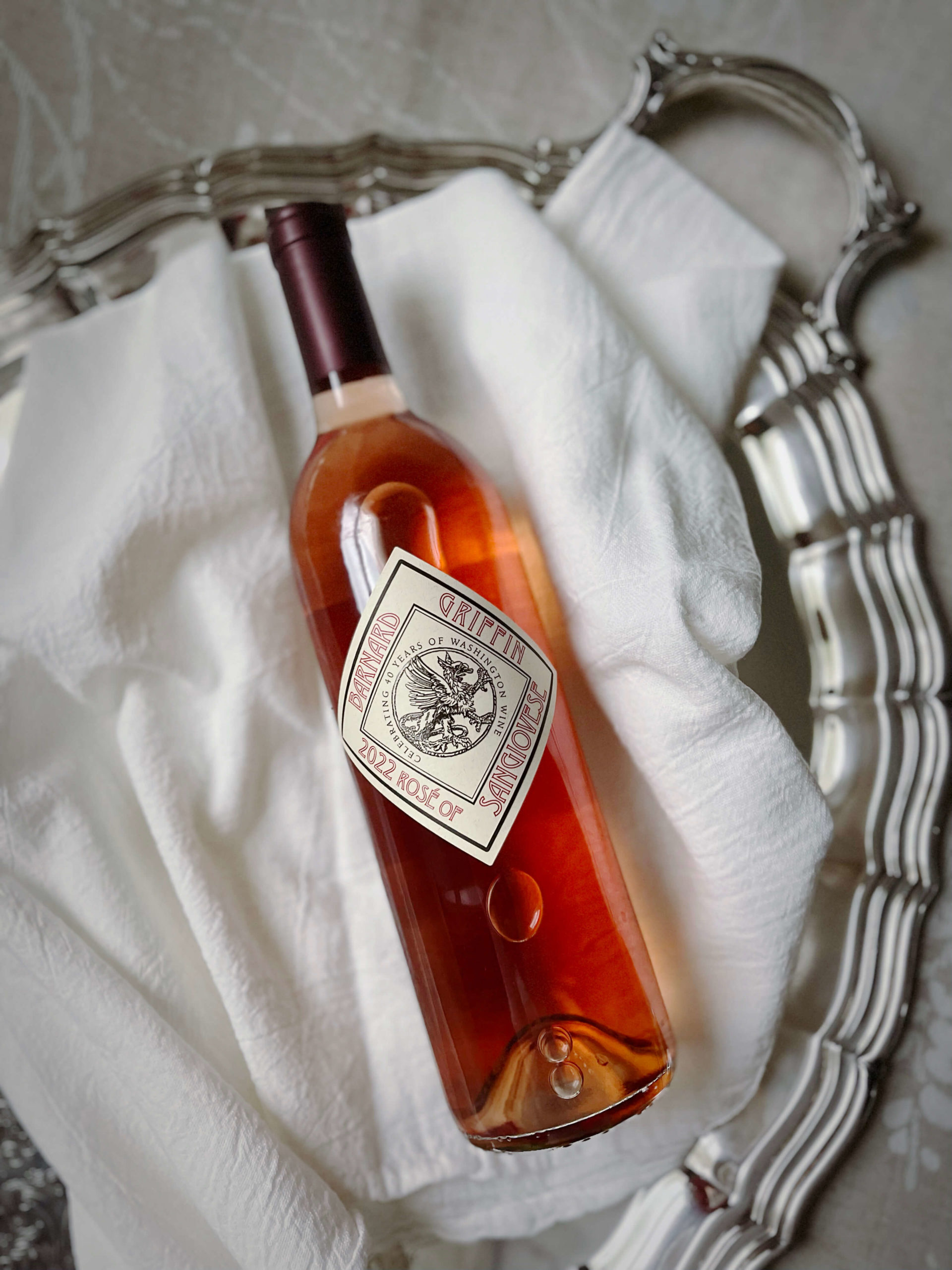 Barnard Griffin 2022 Rosé of Sangiovese on a silver tray.