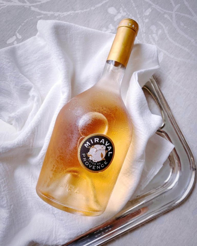 picture of a bottle of Miraval rosé wine on a silver tray